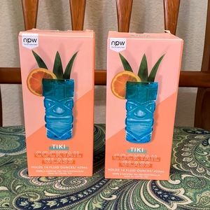 NIB. Two blue glass tiki cocktail glasses.